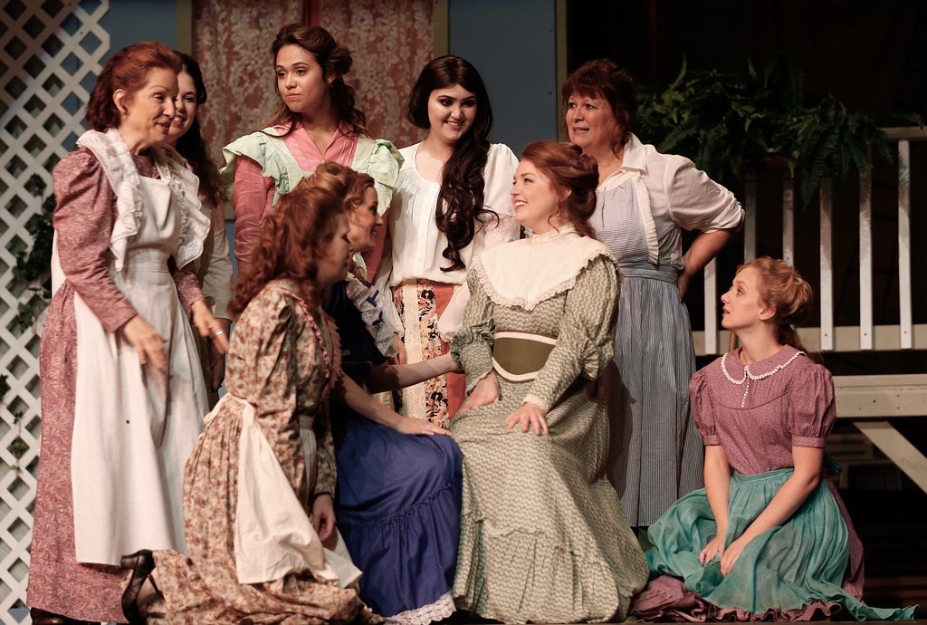 Women gathered at Nettie's Spa porch scene — Carousel