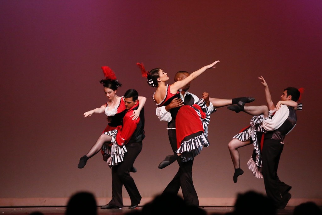 Cancan ensemble with red and black costumes — Carousel