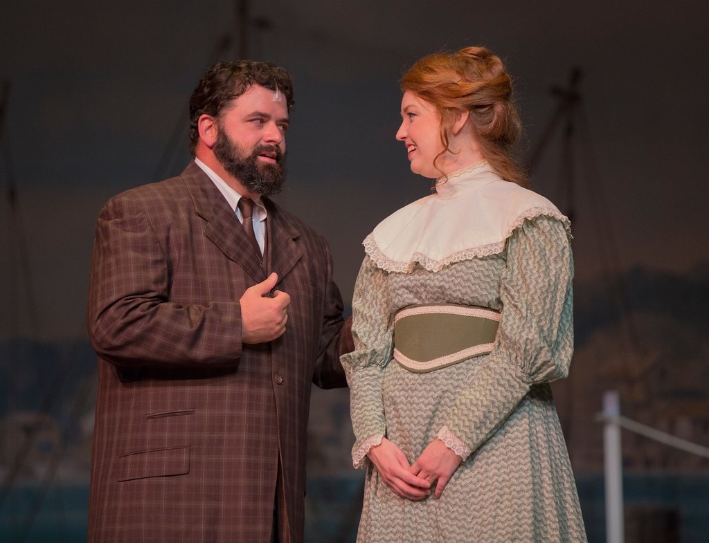Bearded man and Julie conversing at the harbor — Carousel