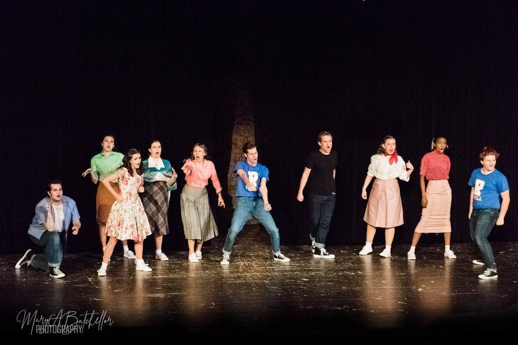 Grease — childrens theater cast on stage