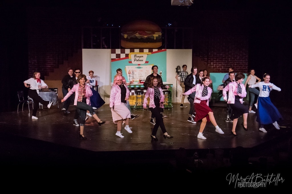 Grease — full cast hand jive number at Burger Palace