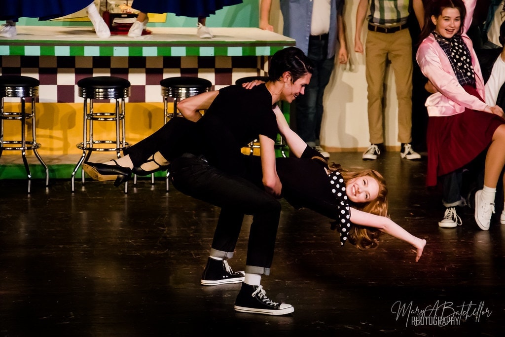 Grease — Danny dipping Sandy in dramatic dance move at diner