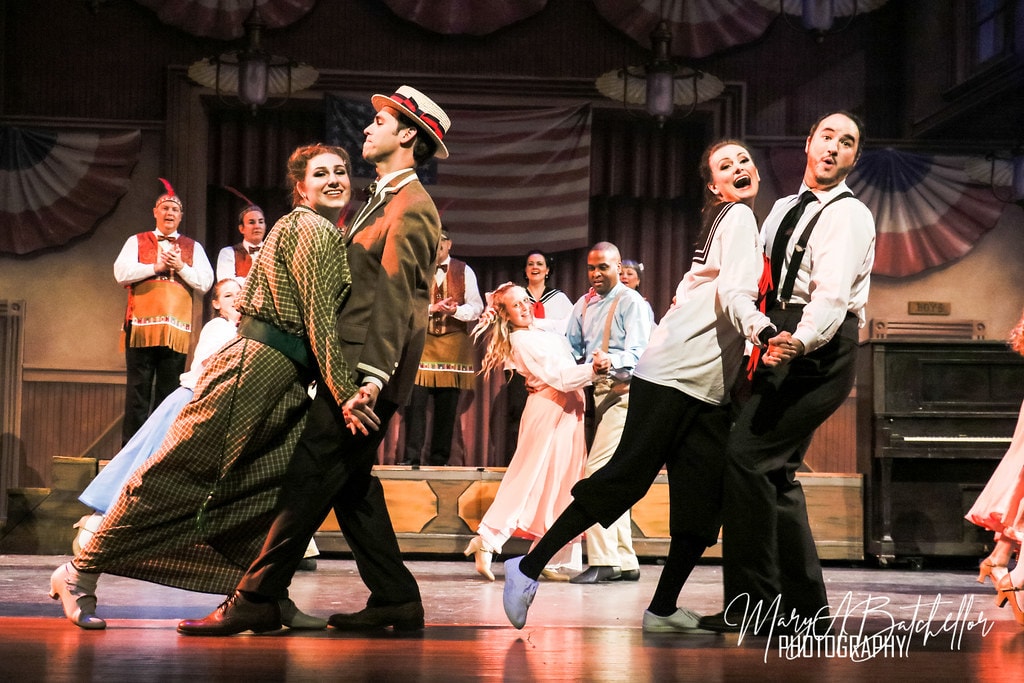 The Music Man — Harold Hill dances with Marian in a plaid dress