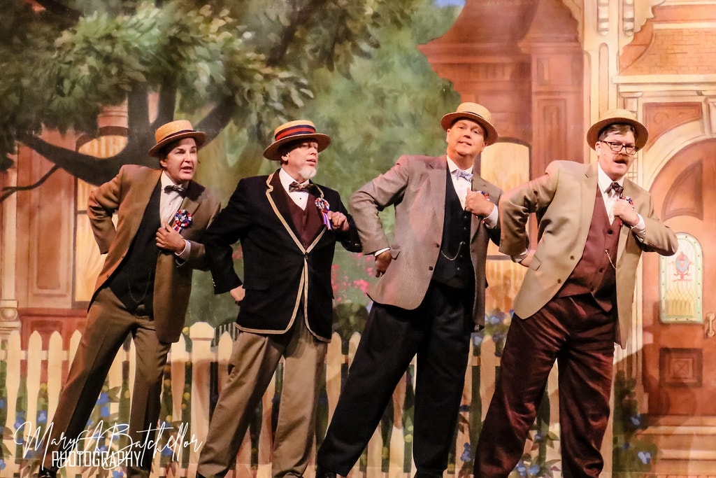 The Music Man — four men in period suits and straw boater hats perform a barbershop quartet