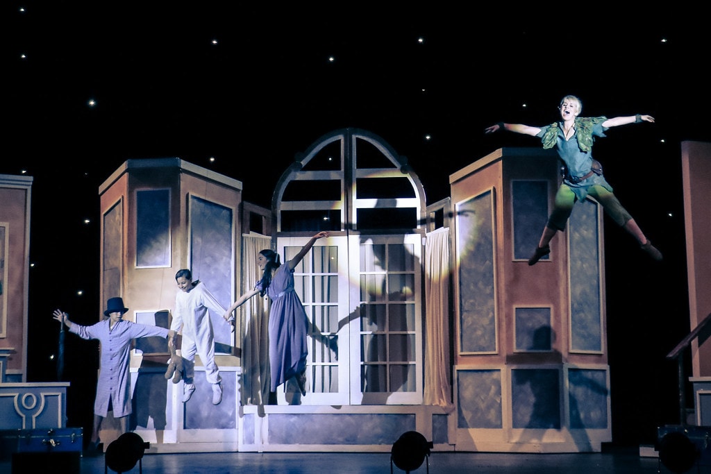 Peter Pan — Peter Pan and the Darling children leap from the nursery window into the starlit night