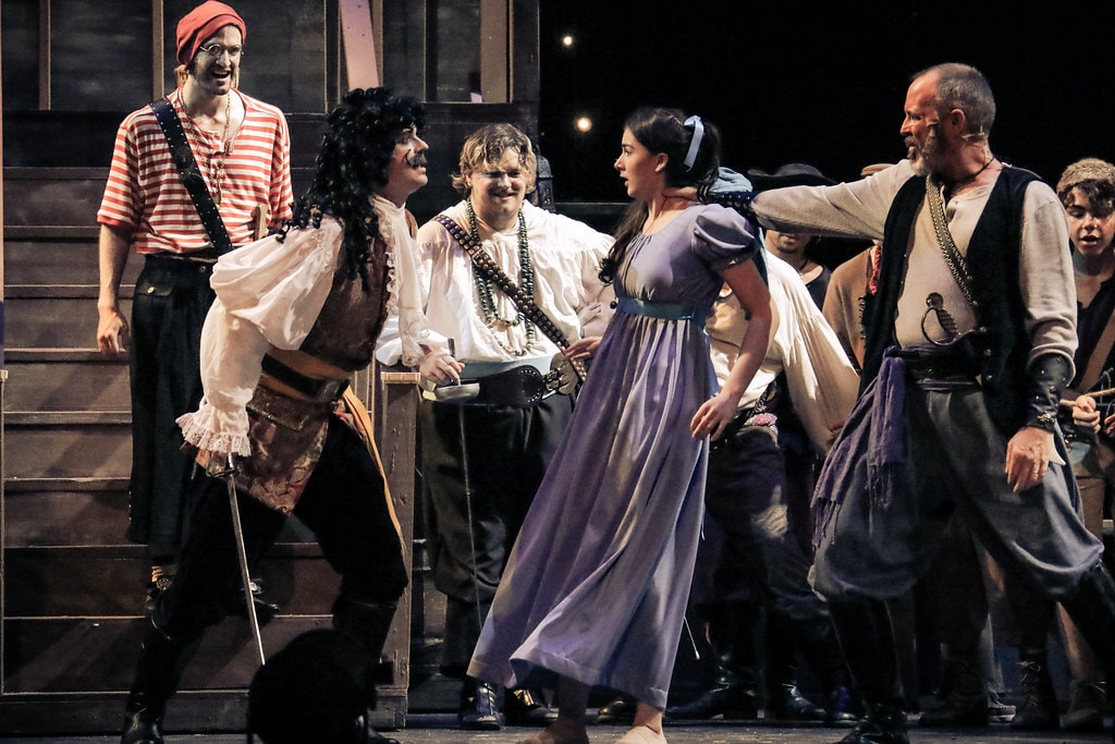 Peter Pan — Wendy as a damsel in distress faces Captain Hook and his pirates on the ship deck set