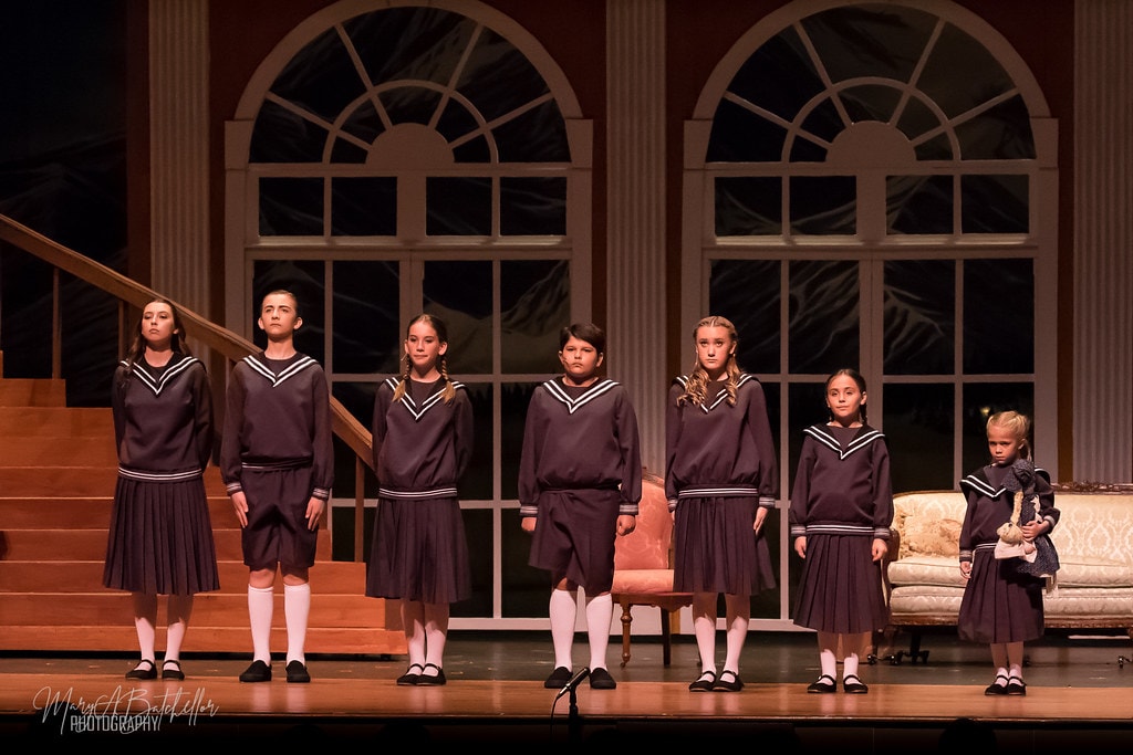 The Sound of Music — seven von Trapp children in sailor uniforms at attention