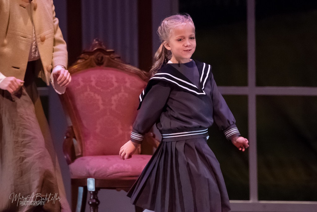 The Sound of Music — youngest von Trapp daughter spinning beside Maria