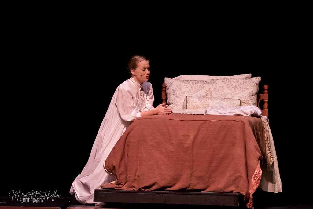 The Sound of Music — Maria in white nightgown kneeling at the foot of the bed