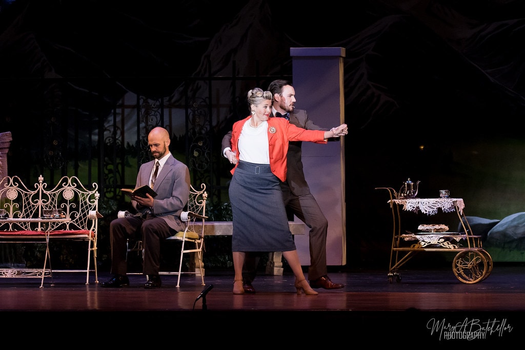 The Sound of Music — Elsa and Captain von Trapp leaning together conspiratorially