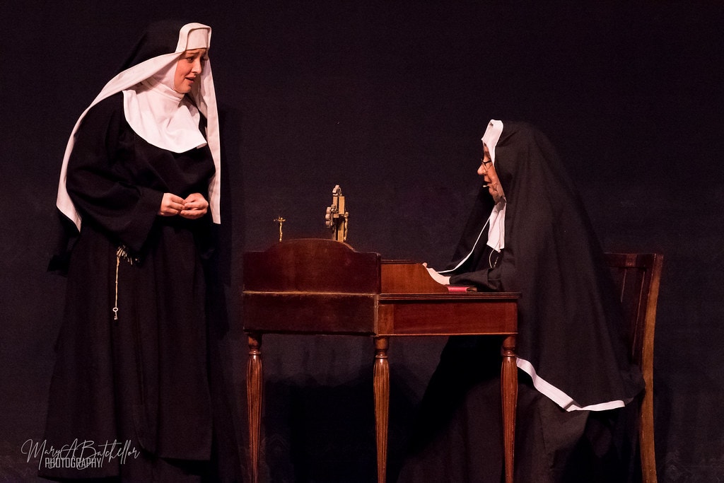The Sound of Music — a nun speaking with the Mother Abbess in the abbey