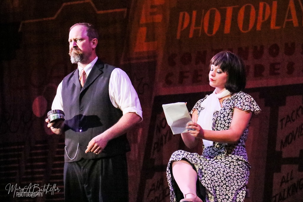 Thoroughly Modern Millie — Trevor Graydon and Millie before a vintage Photoplay movie marquee backdrop