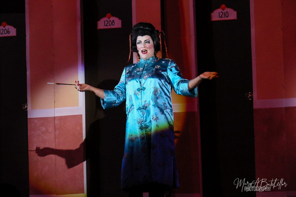 Thoroughly Modern Millie — a woman in a blue robe performs a dramatic scene